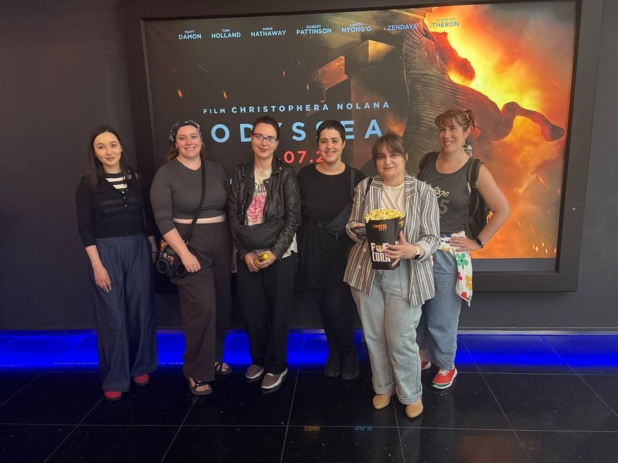 Kino Klub members outside a cinema for a film screening